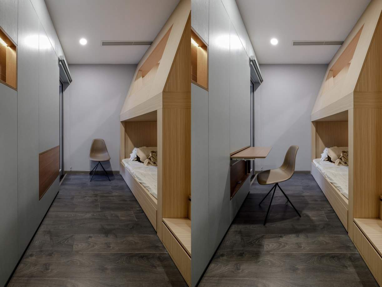 Cạnh giường tầng, KTS sử dụng âm tường có thiết kế bàn học âm để tiết kiệm diện tích